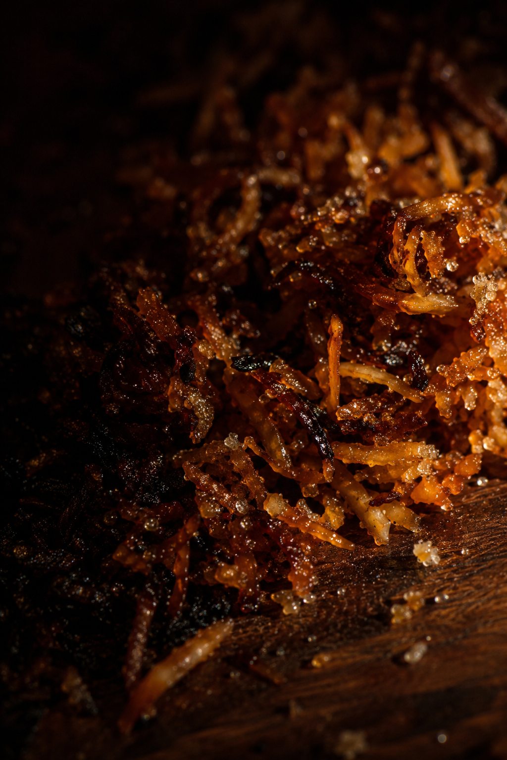 Textura de cocada de coco queimado com coco caramelizado.